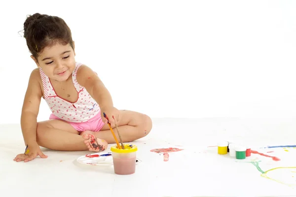 Girl draws on the floor — Stock Photo, Image