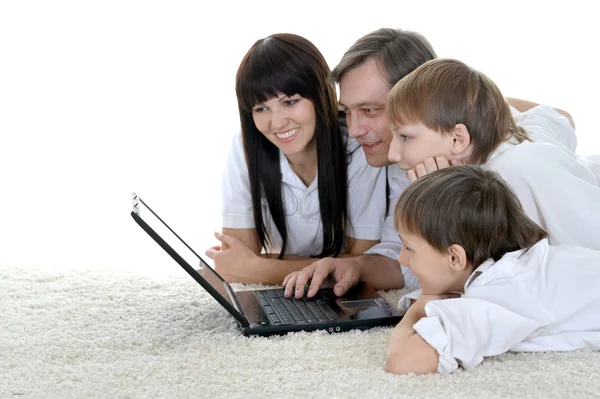 Familia alegre descansando —  Fotos de Stock