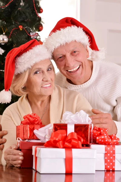 Elderly couple celebrating new year — Stock Photo, Image