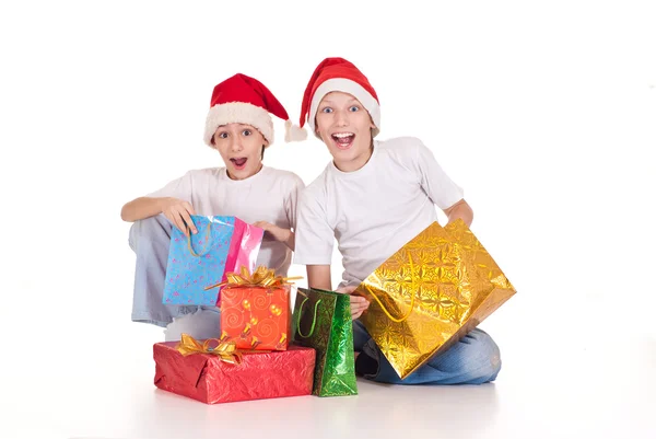 Santa niños con regalos — Foto de Stock