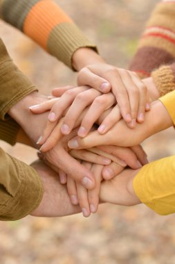 Family hands together clipart