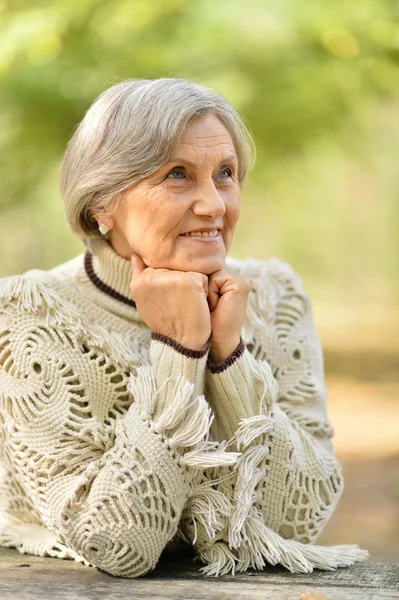 Senior woman in autumn — Stock Photo, Image