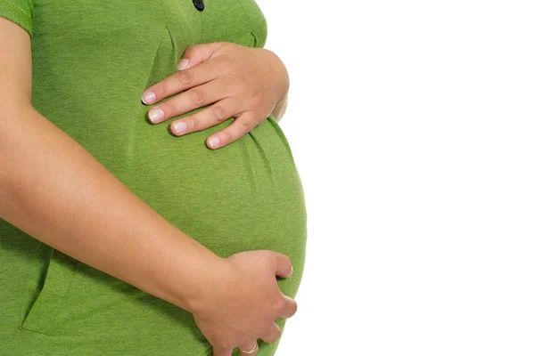 Zwangere vrouw in op een wit — Stockfoto
