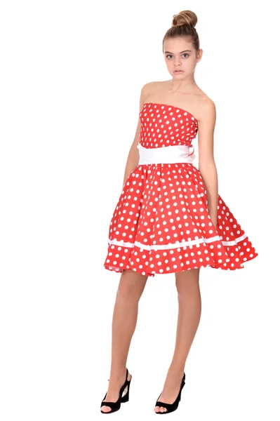 Söt tonårsflicka i en röd klänning — Stockfoto