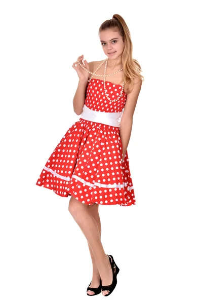 Menina adolescente bonita em um vestido vermelho — Fotografia de Stock