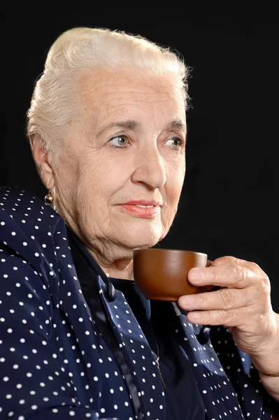 Pensive elderly woman — Stock Photo, Image