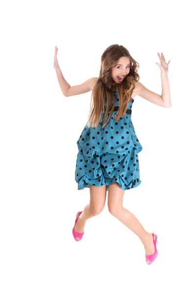 Girl in a blue dress with polka dots — Stock Photo, Image