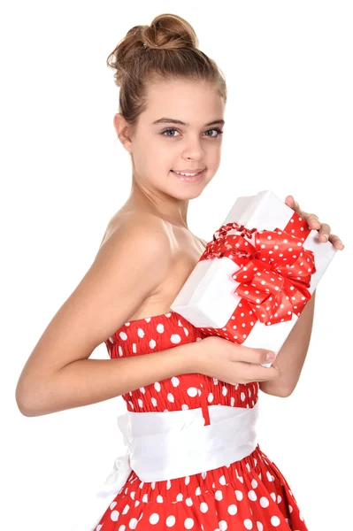 Pretty teenage girl in a red dress — Stock Photo, Image