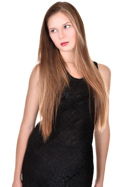 Atraktivní dívka v černých šatech pózuje — Stock fotografie