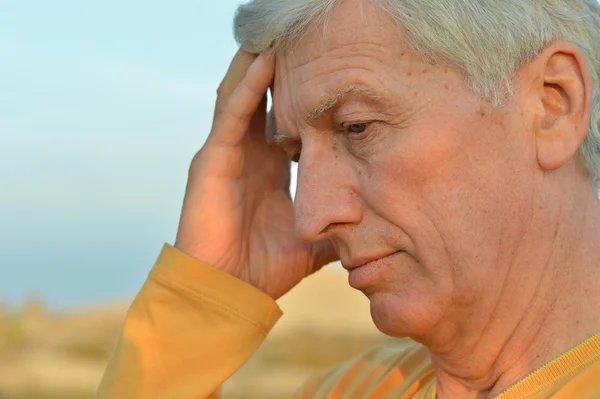 Thoughtful elder man — Stock Photo, Image