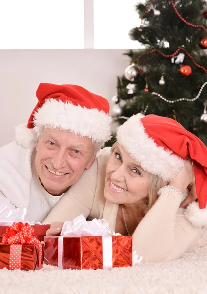 Elderly couple celebrating new year — Stock Photo, Image