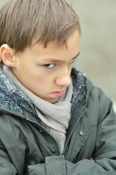 Sad boy in nature — Stock Photo, Image