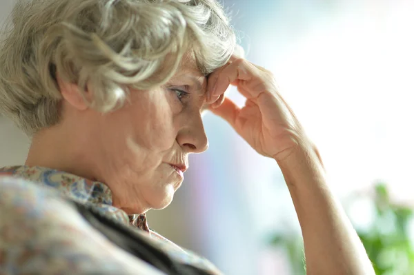 Thoughtful old woman home — Stock Photo, Image