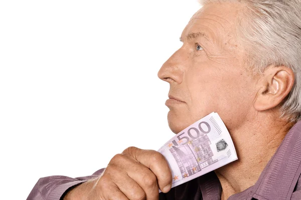 Старший мужчина с евро — стоковое фото