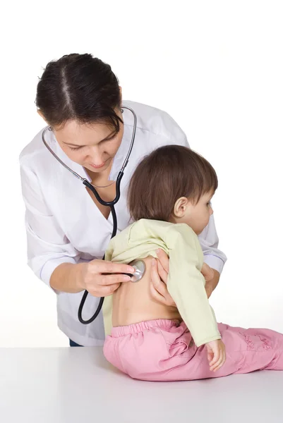 Doutor trabalha com criança — Fotografia de Stock