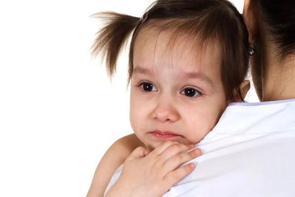 Infermiera caucasica con in braccio una bambina — Foto Stock