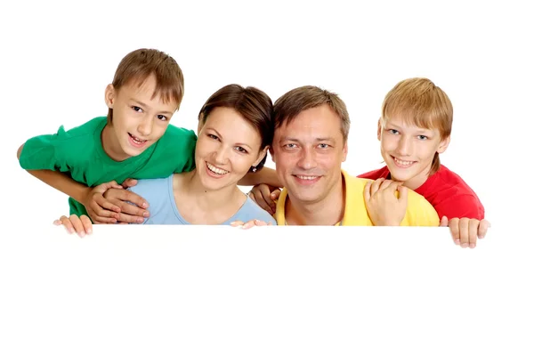 Plesant family in bright T-shirts — Stock Photo, Image