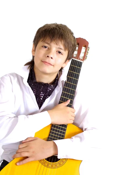 Bambino figo con uno strumento musicale — Foto Stock