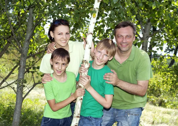 Happy family of four — Stock Photo, Image