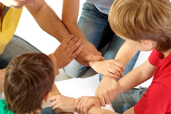 Magnificent family in bright T-shirts — Stock Photo, Image