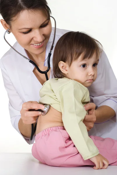 Krankenschwester arbeitet mit Kind — Stockfoto