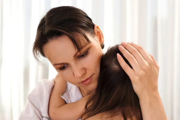 Cool läkare med liten patient — Stockfoto