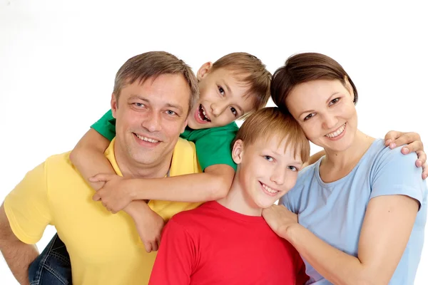 Família soberba em camisetas brilhantes — Fotografia de Stock