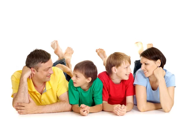 Família feliz em camisetas brilhantes — Fotografia de Stock