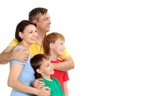 Família feliz em camisetas brilhantes — Fotografia de Stock