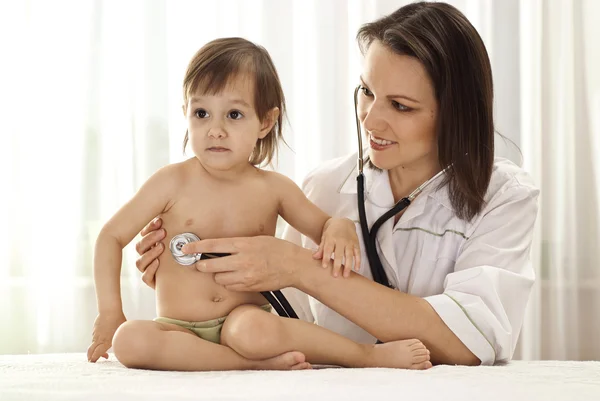 The child to the doctor Stock Image