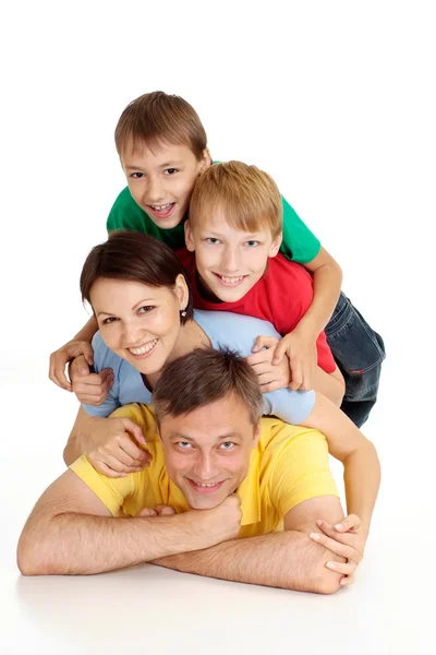 Smiling family in bright T-shirts Stock Image
