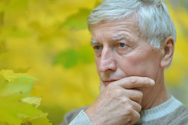 Pensive elderly man — Stock Photo, Image