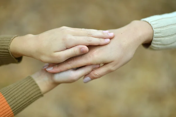 Handen op de achtergrond — Stockfoto