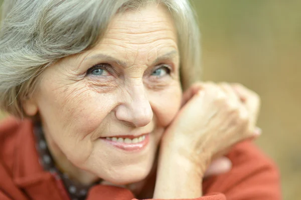 Elderly woman thinking — Stock Photo, Image