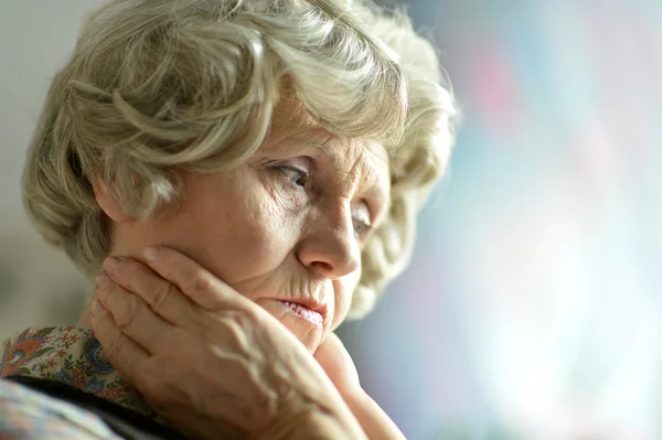 Sad aged woman — Stock Photo, Image
