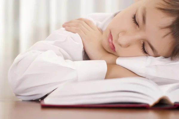 Little boy sleeping with book — Stock Photo, Image