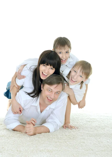 Happy family on the floor — Stock Photo, Image