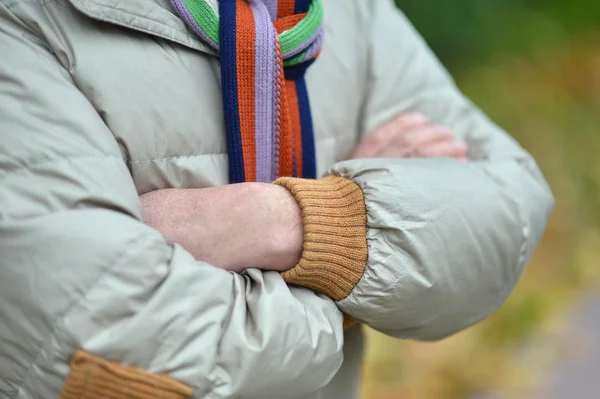 Closeup of man with crossed arms on nature — Stock Photo, Image