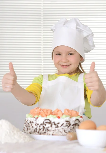 一个厨师的帽子可爱的小女孩 — 图库照片