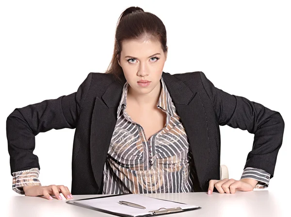Angry secretary at table — Stock Photo, Image