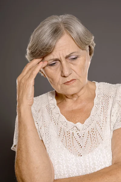 Frau mit Kopfschmerzen — Stockfoto