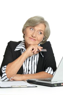 Mature businesswoman working with computer clipart