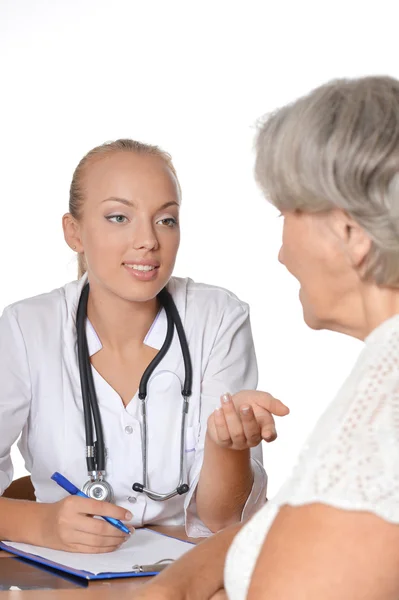 Elderly woman visiting doctor — Stock Photo, Image