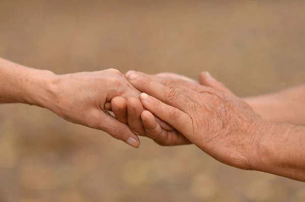 Hands against the fallen — Stock Photo, Image
