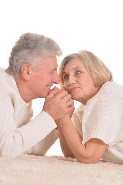 Aged couple lying — Stock Photo, Image