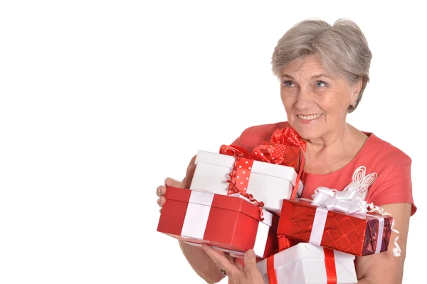 Elderly woman with gifts — Stock Photo, Image
