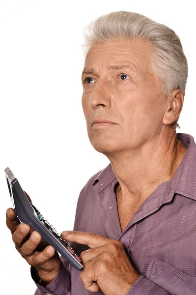 Uomo anziano serio con calcolatrice — Foto Stock