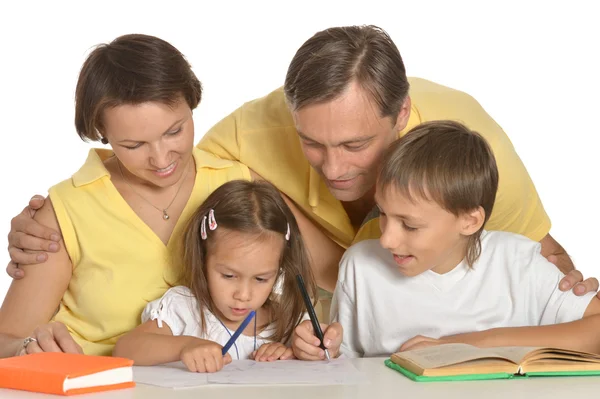 Mother and father helping their kids — Stock Photo, Image