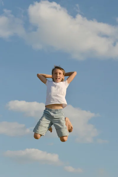 Boy jumping Stock Picture