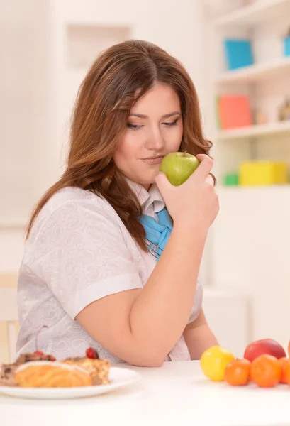 Young woman choosing a diet — Stock Photo, Image